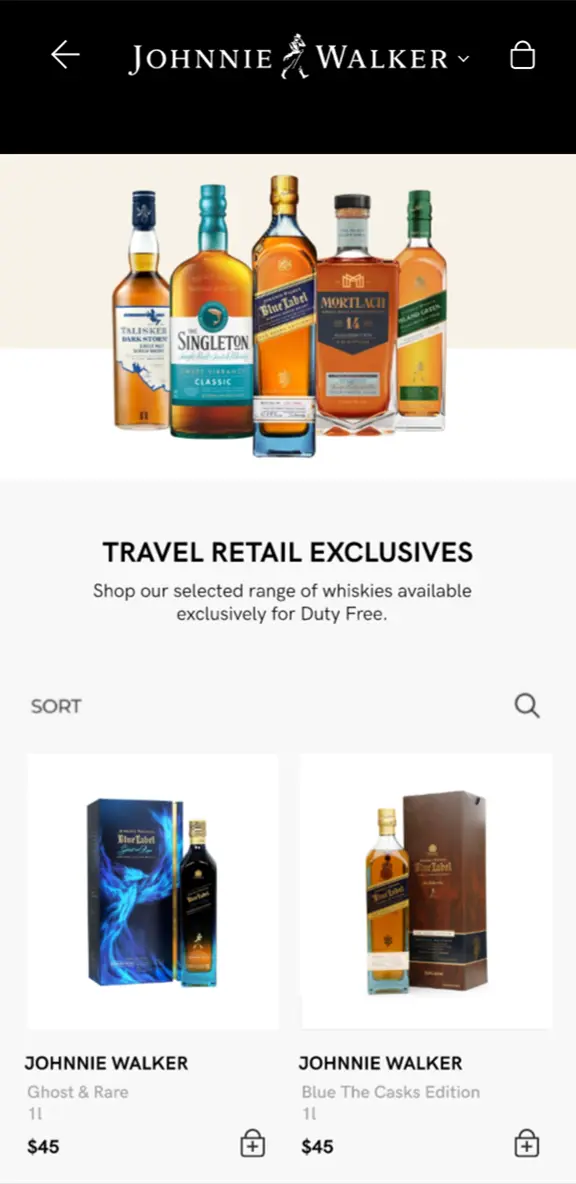 Travel Retail Exclusives category page with product grid showing Johnnie Walker Ghost & Rare and Blue The Casks Edition.
